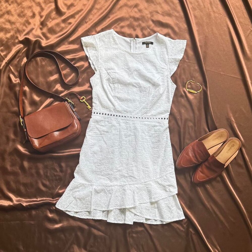 White lace flutter sleeve dress with ruffle hem